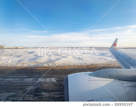 Snow Airport Runway seen from inside the plane (Hokkaido, New Chitose Airport) Snow Airport Runway seen from inside the plane (Hokkaido, New Chitose Airport) 88950197