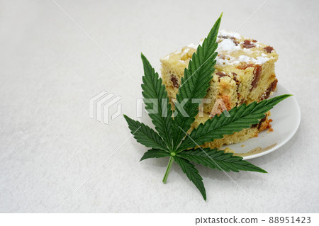 Homemade pie and powdered sugar with CBD oil. Cannabis kitchen 88951423