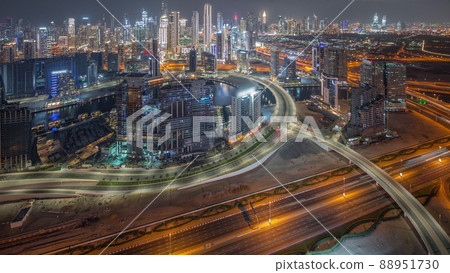 Panoramic skyline of Dubai with business bay and downtown district night timelapse. Panoramic skyline of Dubai with business bay and downtown district night timelapse. 88951730