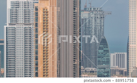 Panoramic skyline of Dubai with business bay and downtown district timelapse. 88951758