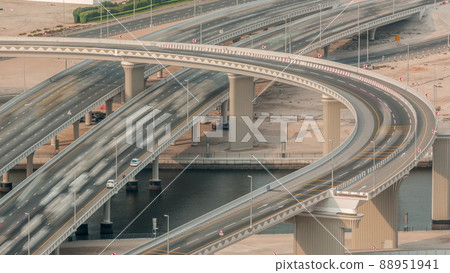 Top view city traffic on a big crossroad in Business bay timelapse. 88951941