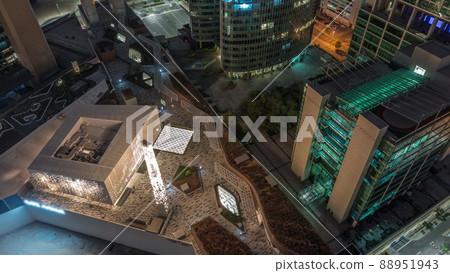 Dubai international financial center skyscrapers aerial night to day timelapse. 88951943