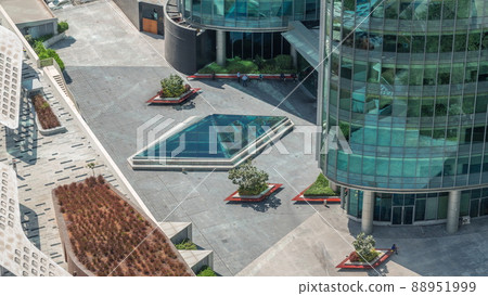 New promenade on gate avenue located in Dubai international financial center aerial timelapse. 88951999