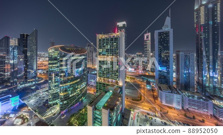 Dubai international financial center skyscrapers aerial night timelapse. Dubai international financial center skyscrapers aerial night timelapse. 88952050