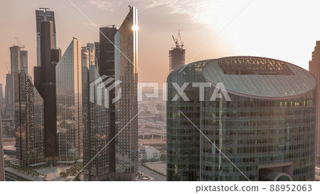 Sunset over Dubai international financial center skyscrapers aerial timelapse. 88952063