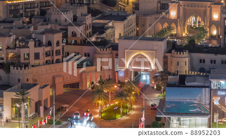 Aerial view to traditional houses of old town island night timelapse from above. Aerial view to traditional houses of old town island night timelapse from above. 88952203