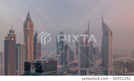 Skyscrapers on Sheikh Zayed Road and DIFC morning timelapse in Dubai, UAE. 88952292