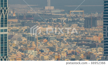 Aerial view of apartment houses and villas in Dubai city timelapse, United Arab Emirates 88952366