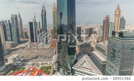 Panorama of futuristic skyscrapers in financial district business center in Dubai on Sheikh Zayed road all day timelapse 88952368