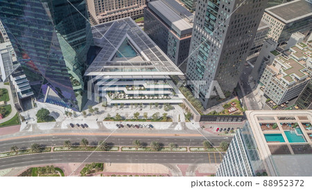 Office tower located in the Dubai International Financial Centre timelapse 88952372