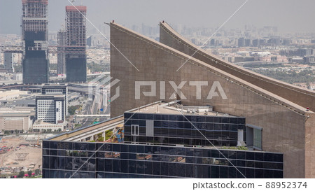 Aerial view of skyscraper rooftop and Bur Dubai, the Creek, Deira district and Sharjah timelapse Aerial view of skyscraper rooftop and Bur Dubai, the Creek, Deira district and Sharjah timelapse 88952374