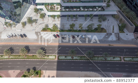 Office tower located in the Dubai International Financial Centre timelapse 88952377