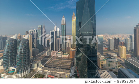 Panorama of futuristic skyscrapers in financial district business center in Dubai on Sheikh Zayed road timelapse Panorama of futuristic skyscrapers in financial district business center in Dubai on Sheikh Zayed road timelapse 88952394
