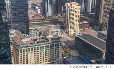 Hotels and office buildings in financial district in Dubai aerial timelapse 88952397