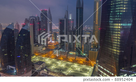 Financial center of Dubai city with luxury skyscrapers night to day timelapse, Dubai, United Arab Emirates 88952404