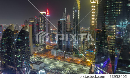 Financial center of Dubai city with luxury skyscrapers all night timelapse, Dubai, United Arab Emirates 88952405