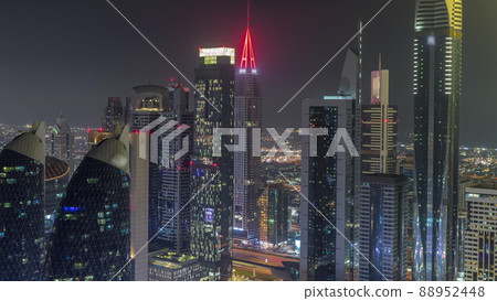 Financial center of Dubai city with luxury skyscrapers night timelapse, Dubai, United Arab Emirates 88952448