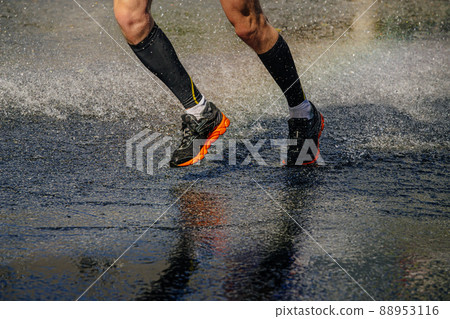 male athlete in compression socks run water male athlete in compression socks run water 88953116