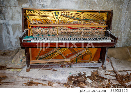 Old piano in abandoned apartment in the ghost town Pripyat in Chernobyl Exclusion Zone, Ukraine 88953535