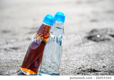 Bottled juice that looks like a man and a woman Bottled juice that looks like a man and a woman 88954169