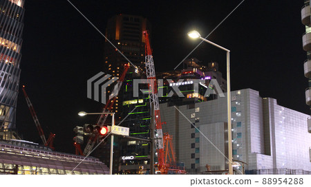 Construction site in front of the station at night in Shibuya 88954288