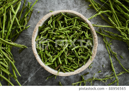 bowl with the edible part of some asparagus bowl with the edible part of some asparagus 88956565