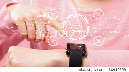 Online shopping theme with woman pressing smart watch 88956569