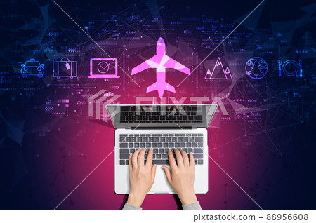 Flight ticket booking concept with person using laptop 88956608