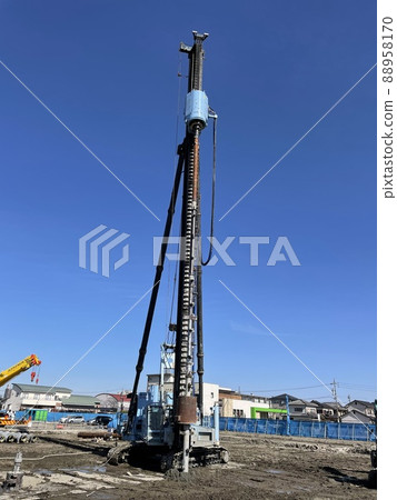 Pile driver at construction site 88958170