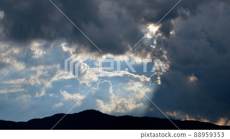 Blue sky seen in the clouds from the city of Tatsuno 88959353