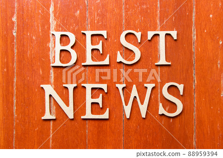 Alphabet letter in word best news on old red color wood plate background 88959394