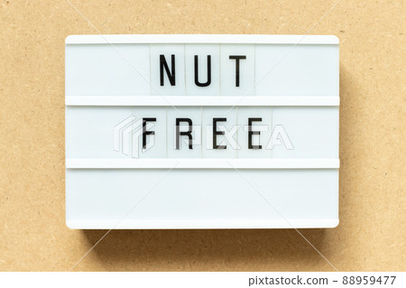 Lightbox with word nut free on wood background Lightbox with word nut free on wood background 88959477