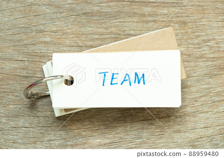 Flash card with handwriting word team on wood background Flash card with handwriting word team on wood background 88959480