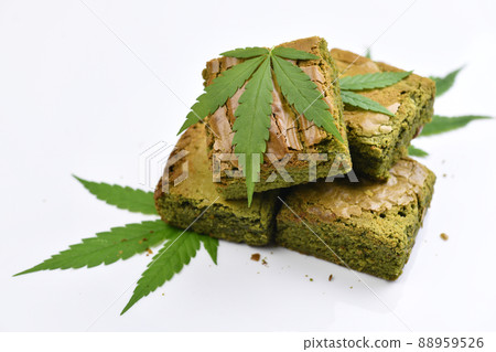Cannabis brownies topped with marijuana leaves for home consumption and recreational medicinal Cannabis brownies topped with marijuana leaves for home consumption and recreational medicinal 88959526
