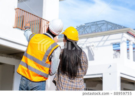 Engineer team work planning in construction site,Construction Contractors building a new home. Engineer team work planning in construction site,Construction Contractors building a new home. 88959755