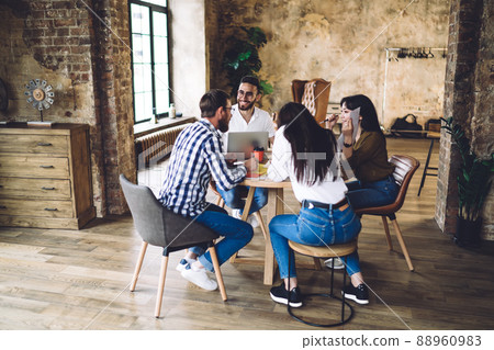 Skilled hipster guys 20s discussing freelance projecting and productive remote job 88960983