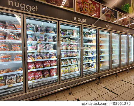 MELAKA, MALAYSIA - Frozen food that has been packed in commercial packs is stored and displayed in a large chiller. This chiller is able to maintain the freshness of the food. 88961273