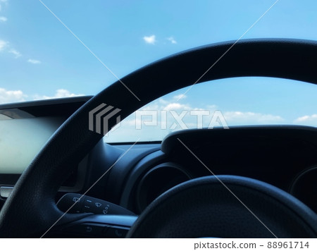 Blue sky seen from inside the car 88961714