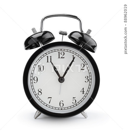 Vintage alarm clock isolated on white. Vintage alarm clock isolated on white. 88962019
