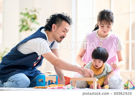 Male and female childcare worker image Male and female childcare worker image 88962920