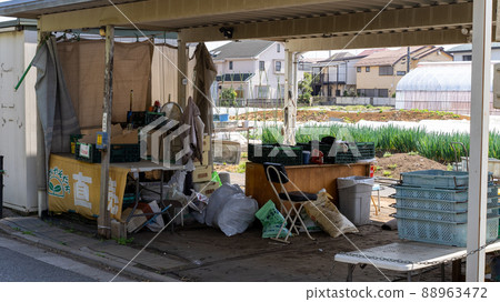 Farmer's vegetable shop in a residential area 88963472