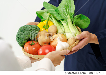 Hand over vegetables Hand over vegetables 88966710