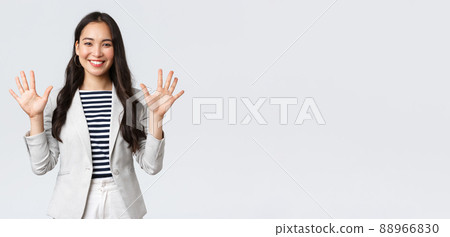 Business, finance and employment, female successful entrepreneurs concept. Smiling elegant asian woman in suit, businesswoman smiling and showing ten fingers, propose good deal Business, finance and employment, female successful entrepreneurs concept. Smiling elegant asian woman in suit, businesswoman smiling and showing ten fingers, propose good deal 88966830