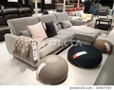 SELANGOR, MALAYSIA - JULY 4, 2022: Sofa furniture and chairs in the IKEA showroom in Malaysia. The furniture is well arranged to make it easy for customers to see and inspect it before buying. 88967390