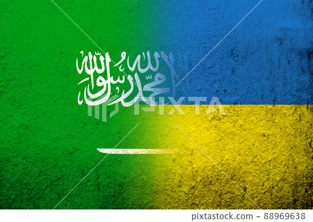 The Kingdom of Saudi Arabia National flag with National flag of Ukraine. Grunge background 88969638