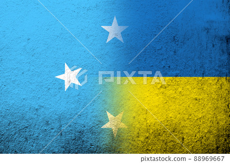 The Federated States of Micronesia national flag with National flag of Ukraine. Grunge background 88969667
