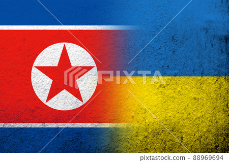 North Korea National flag with National flag of Ukraine. Grunge background 88969694