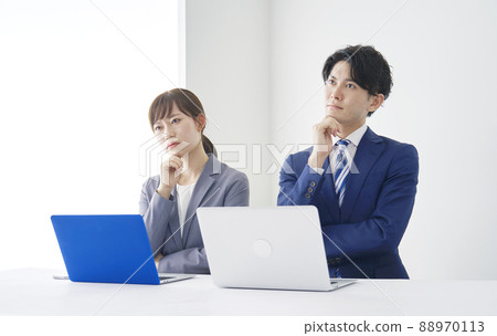 Business woman and businessman thinking office Business woman and businessman thinking office 88970113