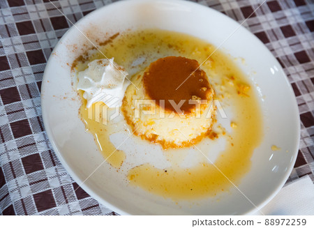 Typical catalan creme dessert flan con nata with caramel crust 88972259