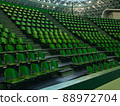 Audience seats on an unmanned tennis court 88972704